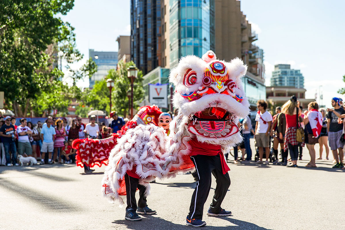 Performers doing the dragon dance in Calgary's chinatown
