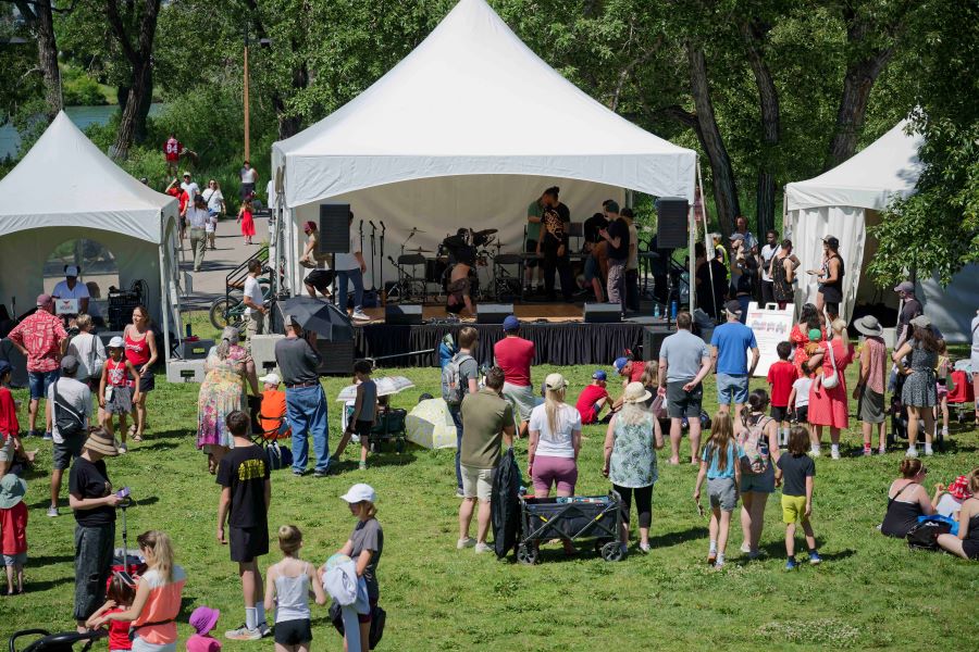 Kids in costumes walking around an event