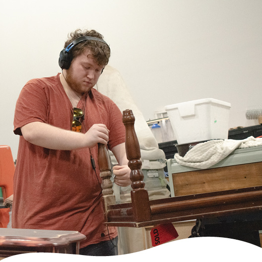 awaken garden collective members standing in garden