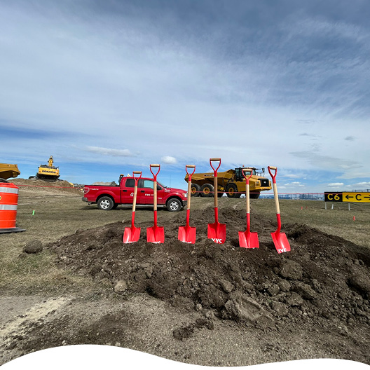 people holding bags of plant seeds