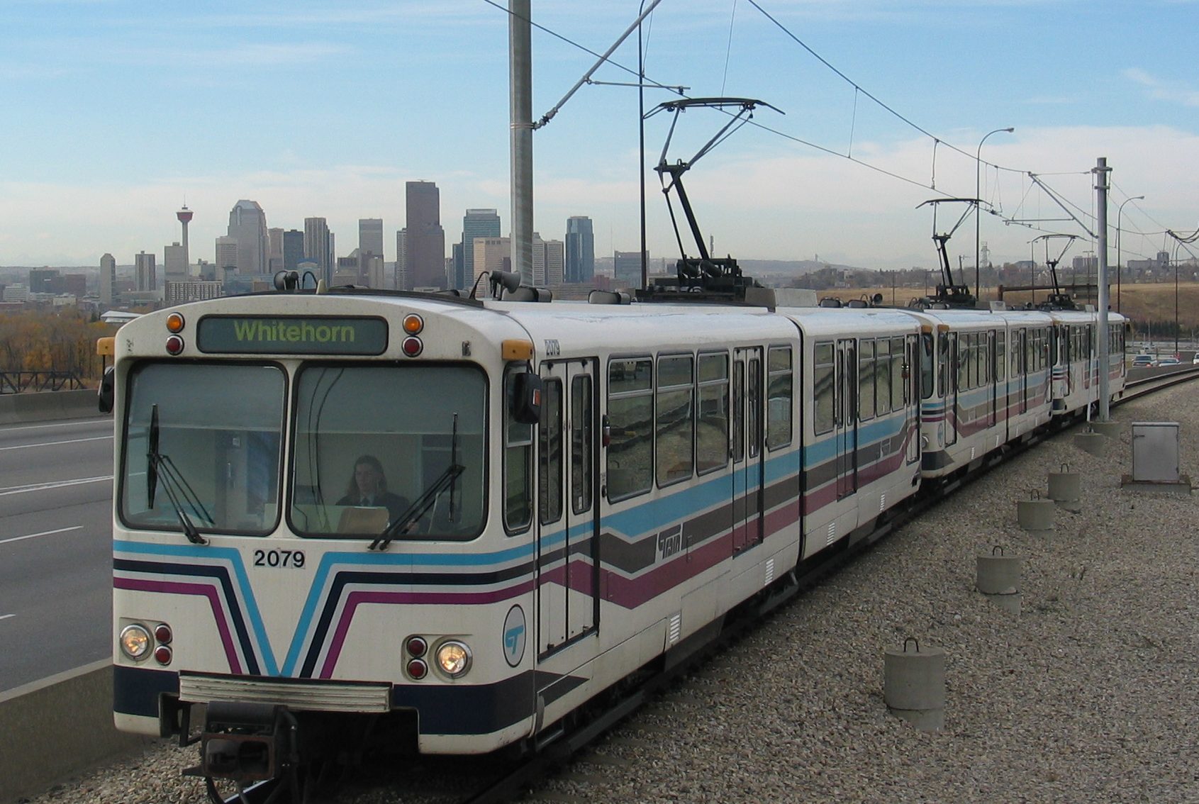 Siemens-Duewag U2 - Car 2079, Series 4 operating with the Calgary downtown skyline in the background.